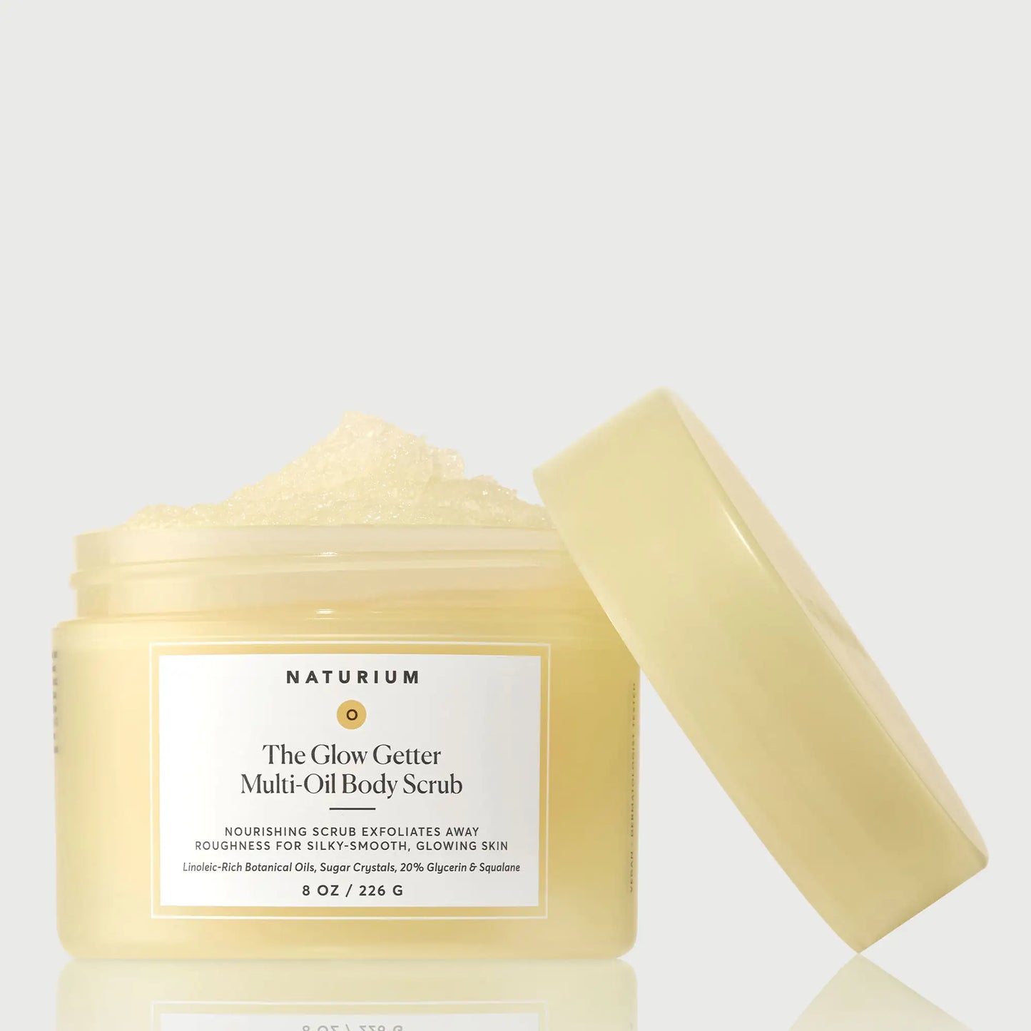 the-glow-getter-multi-oil-body-scrub-e8 NATR-40028-GlowGetter-Multi-Oil-Body-Scrub-Front-CapOff-bonebkgd.webp