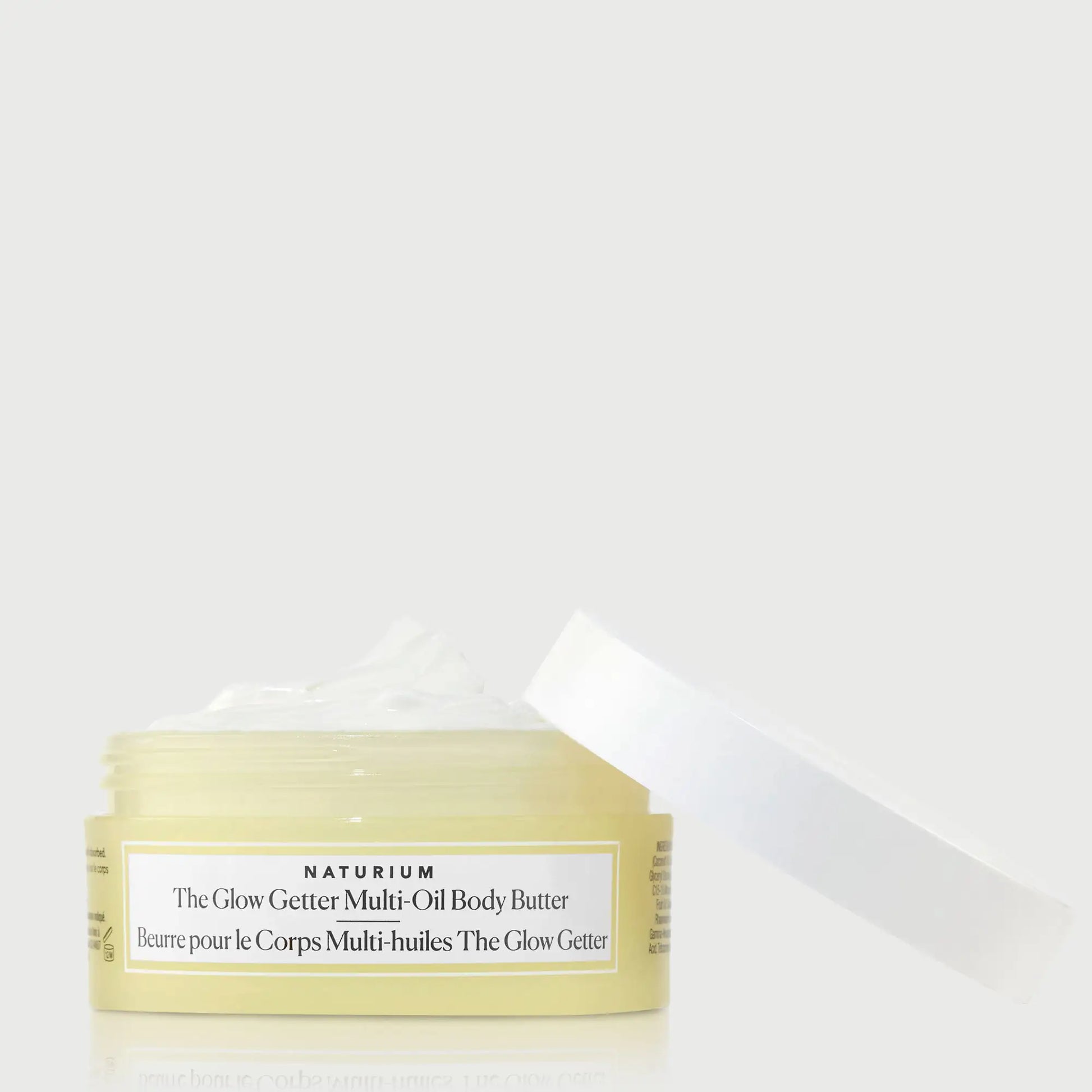 the-glow-getter-multi-oil-body-butter-travel-size-u0 NATR-40115_Glow-Getter-Body-Butter-Mini_front_capoff_bonebkgd.webp